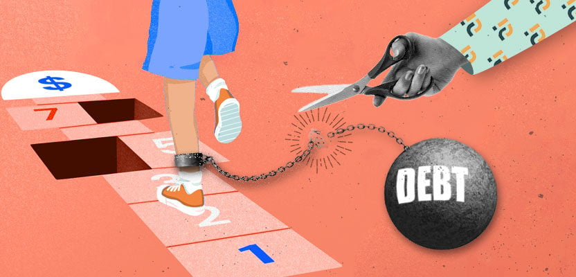 Scissors cutting a ball and chain that represents debt