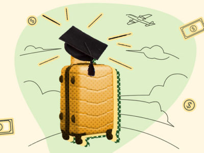 Suitcase and graduate's cap representing traveling on a budget after graduation