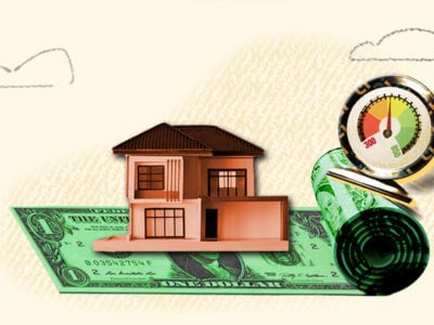 House and credit gauge sitting on a dollar bill that represents refinancing a loan