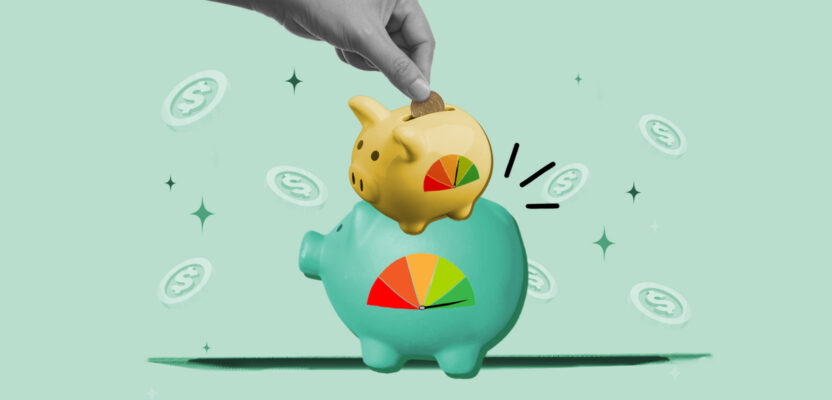 Piggy bank with credit score gauge on top of another piggy bank