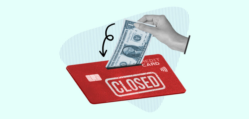 Money being inserted into credit card labeled "Closed" representing a closed account