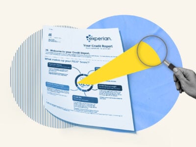 Magnifying glass shining light on soft inquiry section on a credit report