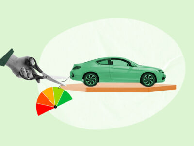 Credit score gauge being removed from car, symbolizing getting a car with no credit