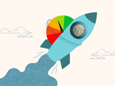 Credit score gauge on a rocket representing building credit fast