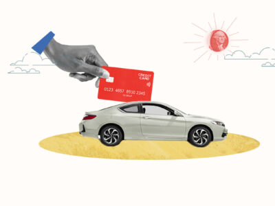 Credit card being used to buy a car