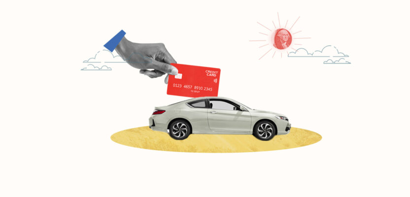 Credit card being used to buy a car