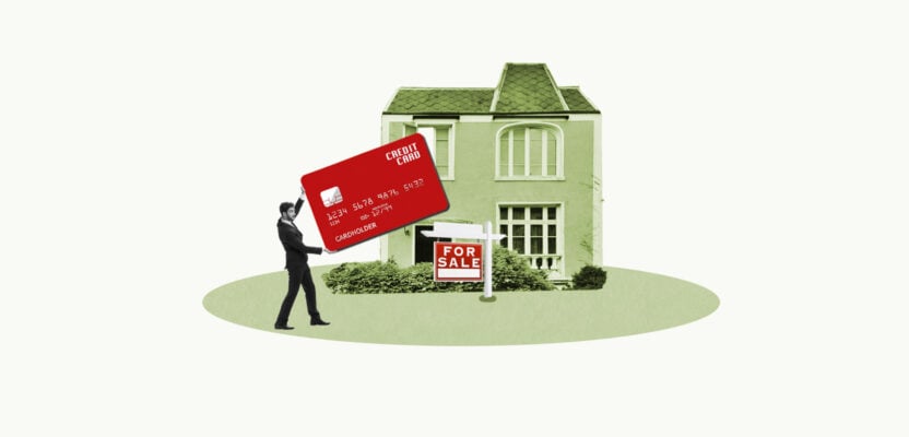 Person buying a house with a credit card