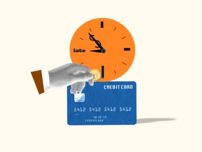 Coin being inserted into a clock next to a credit card, which represents credit card late fees